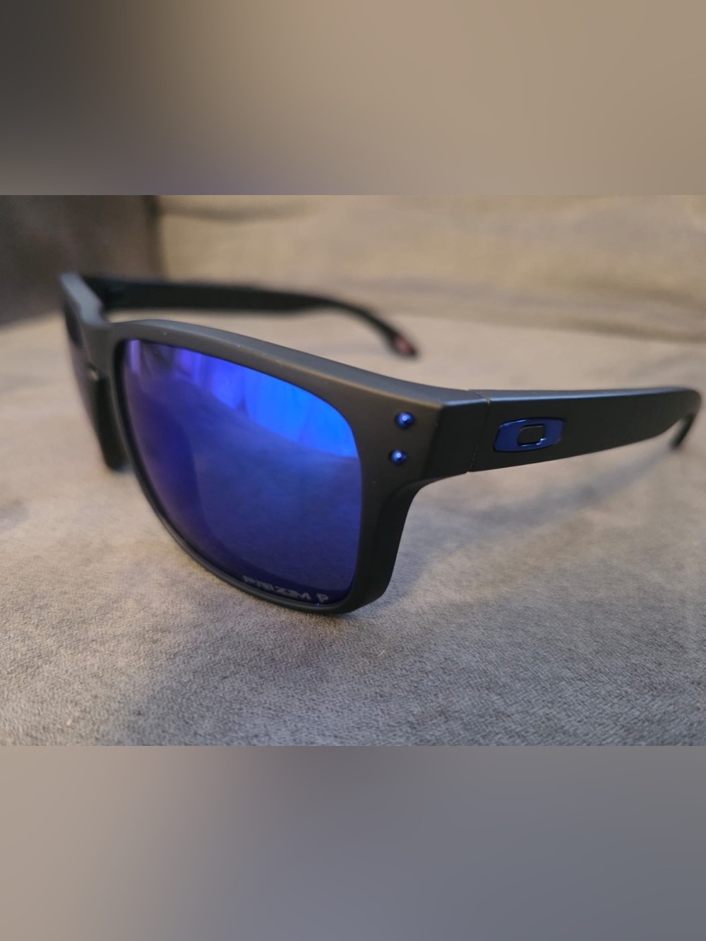 Oakley Matte Black Sunglasses with Blue lenses
